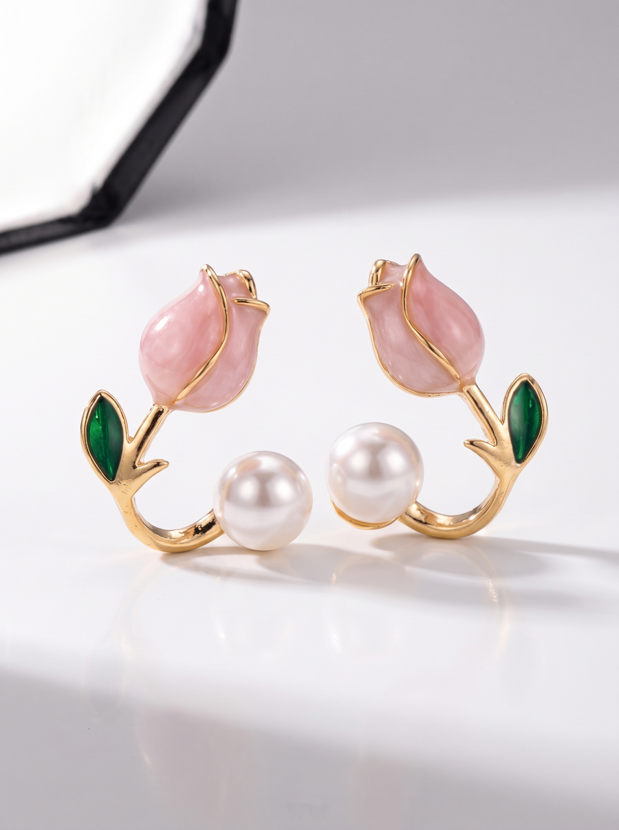 Tulip Pearl Earrings, gold-tone, angled view of the enamel tulip, leaf and pearl on each cuff