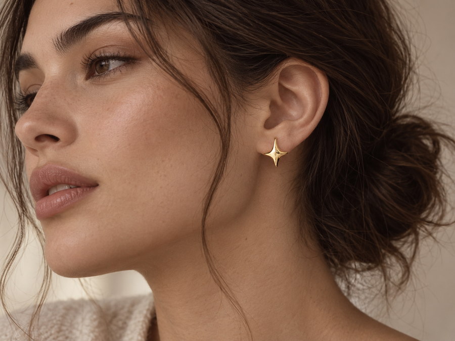 Model with her hair up wearing the Twinkle Studs in 18K gold vermeil
