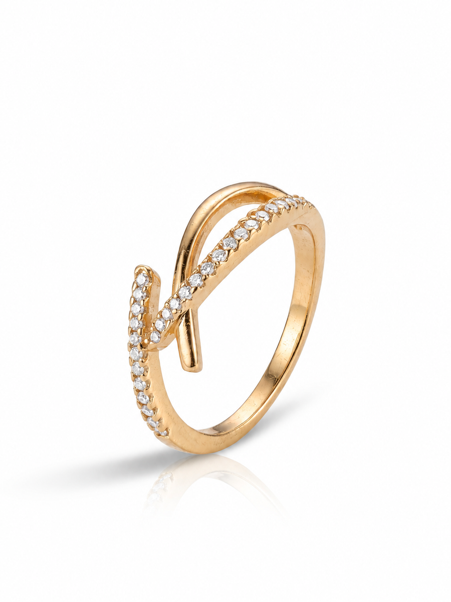 Tangent Ring in 18K gold vermeil: two pavé lines crossing once and meeting at a single stone