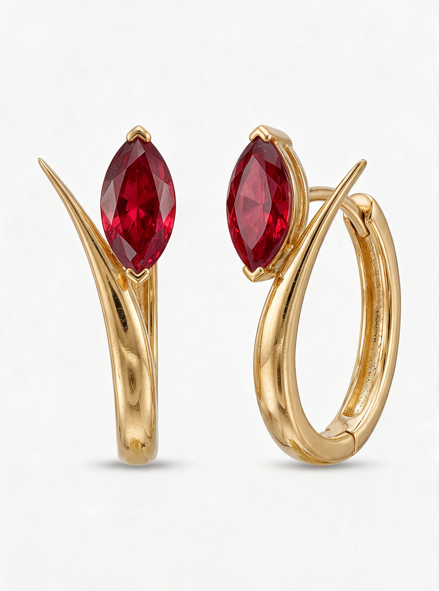 Leaf Hoops in 18K gold vermeil with a red marquise stone at the tip of each leaf-shaped hoop