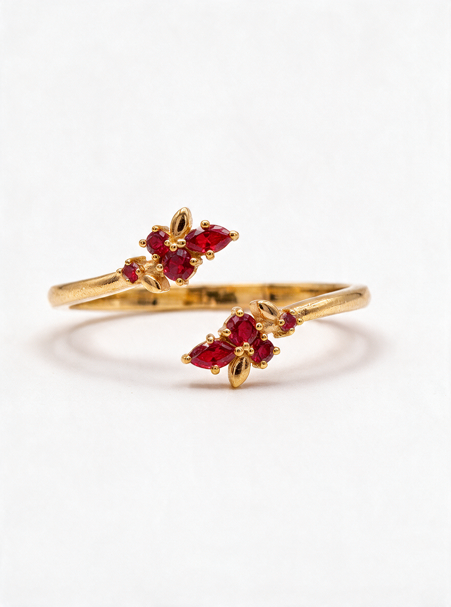 Bloom Ring in 18K gold vermeil with red stones clustered into small flowers on an open band