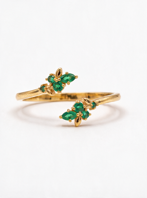 Bloom Ring in 18K gold vermeil with green stones clustered into small flowers on an open band