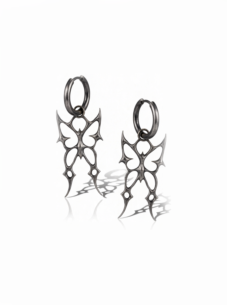 Barbed Butterfly Earrings in oxidised silver: butterfly silhouettes with barbed, jagged wings