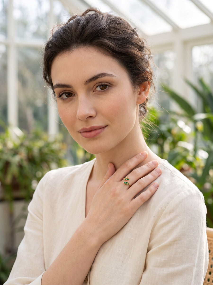 Model wearing the Bloom Ring in 18K Gold Vermeil with green stones