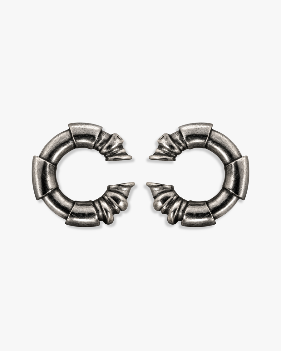 Segment Hoops in oxidised silver: armour-like segments ending in small clawed points