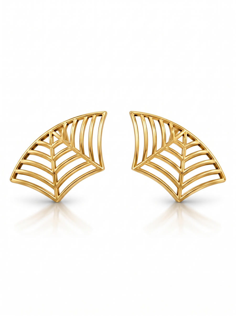 Cobweb Ear Cuff in 18K gold vermeil: fine web lines radiating across a fan-shaped cuff