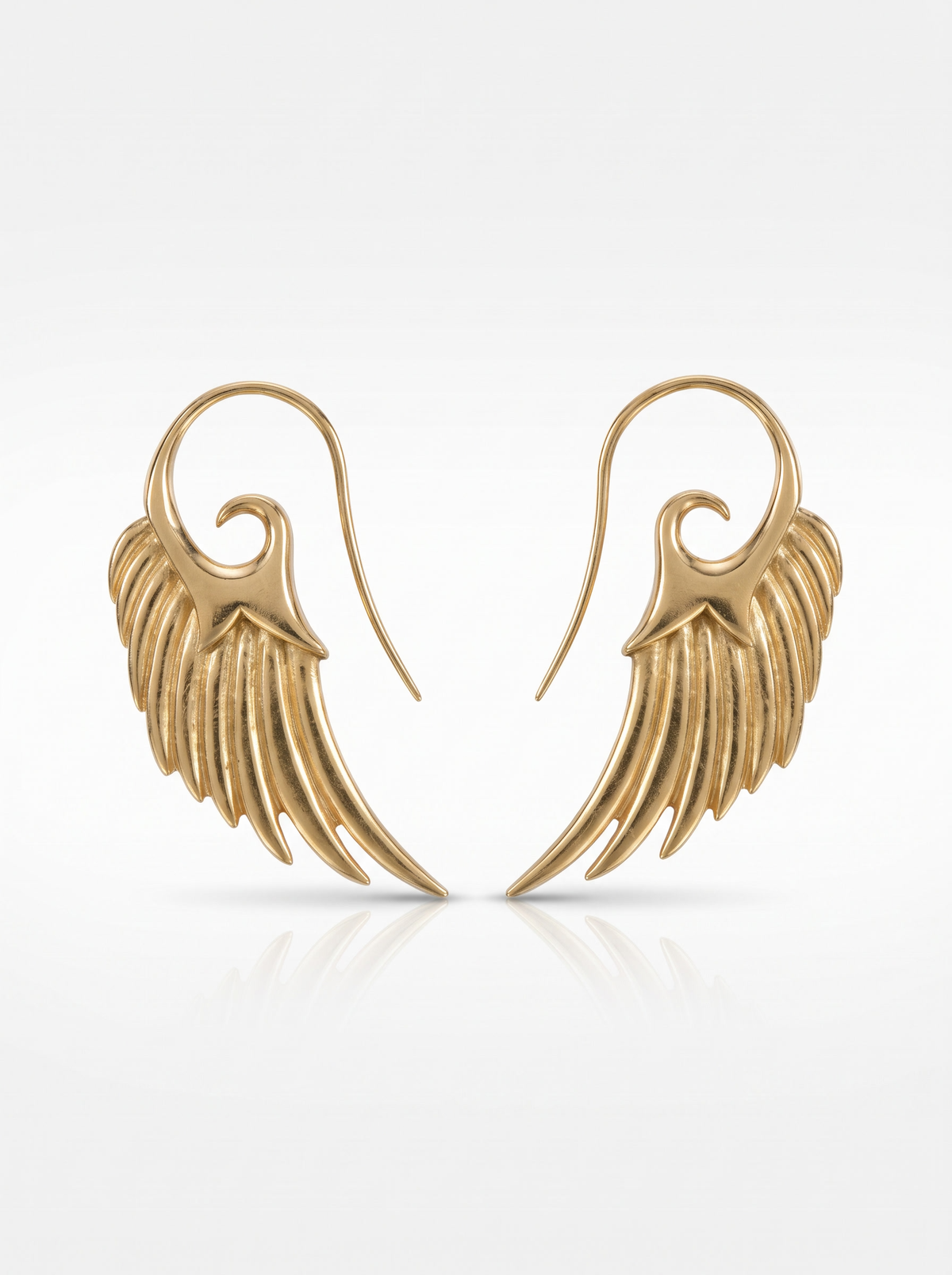 Wing Hook Earrings in 18K gold vermeil: carved feathered wings on spiralling hooks