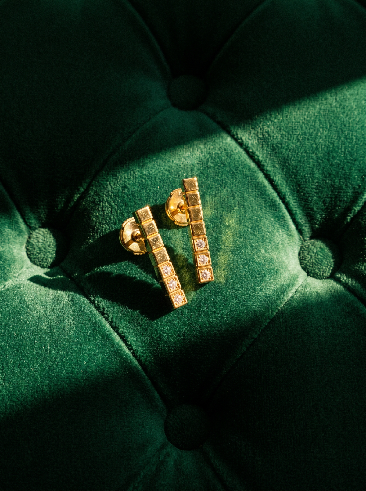 Stacked Cube Earrings in 18K gold vermeil with white stones on green tufted velvet