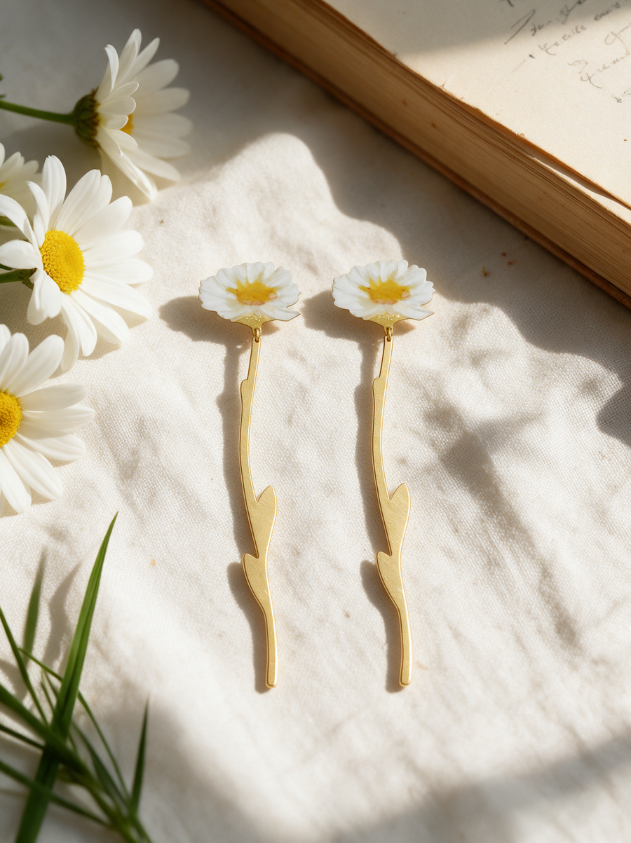 Daisy Stem Earrings on cream linen with fresh daisies