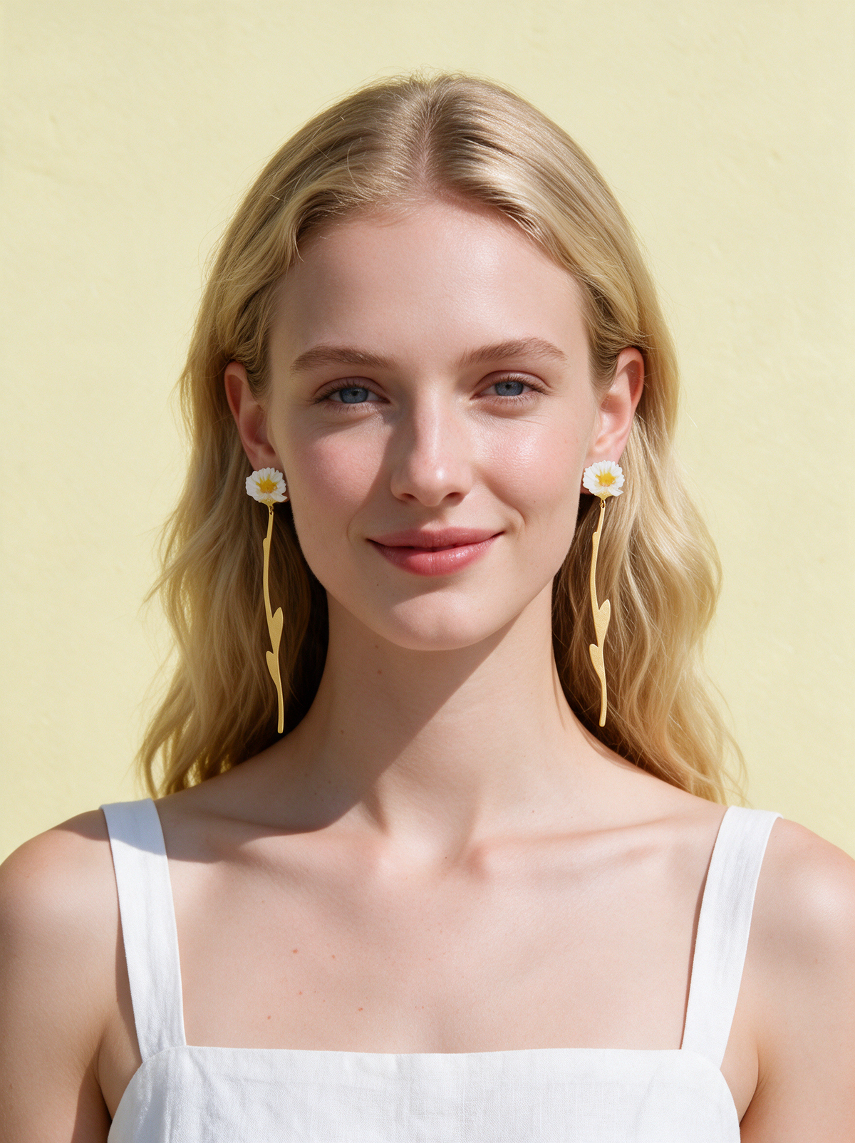 Daisy Stem Earrings worn on both ears
