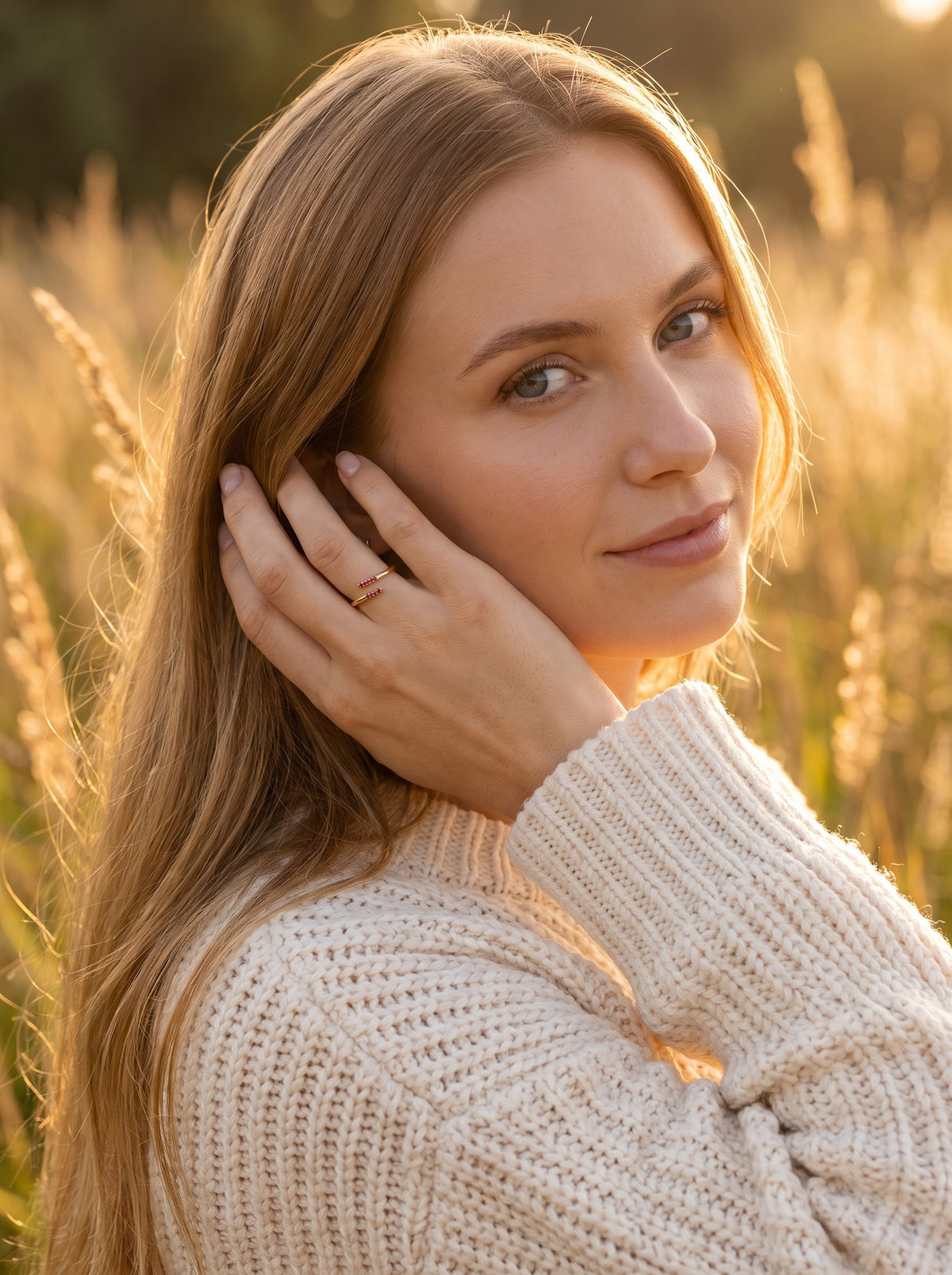 Model wearing the Parallel Ring in 18K Gold Vermeil with red stones